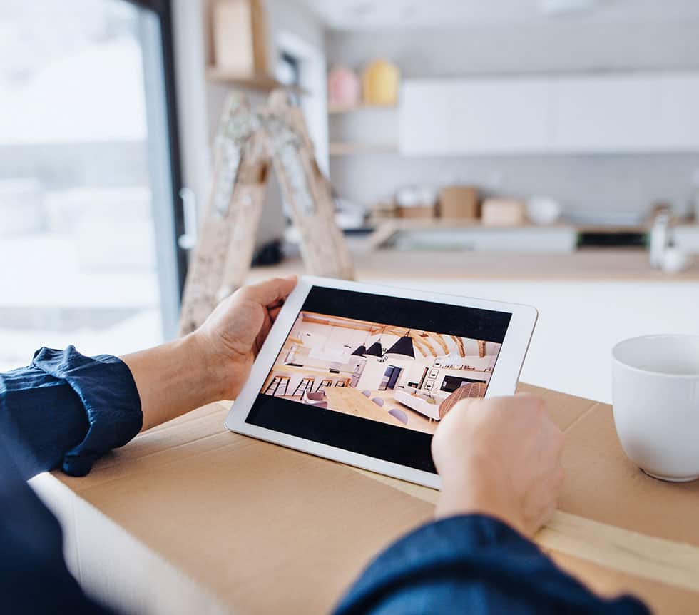 a person holding a tablet